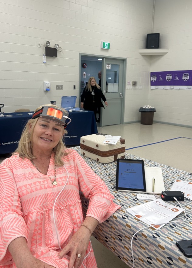 Attendee trying PBM wellness at our booth